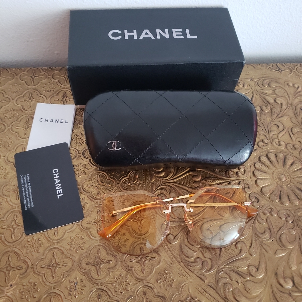 Yellow chanel sunglasses read description